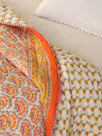 AMBER BLOOM ORANGE HAND BLOCK PRINT REVERSIBLE COTTON QUILT/RAZAI