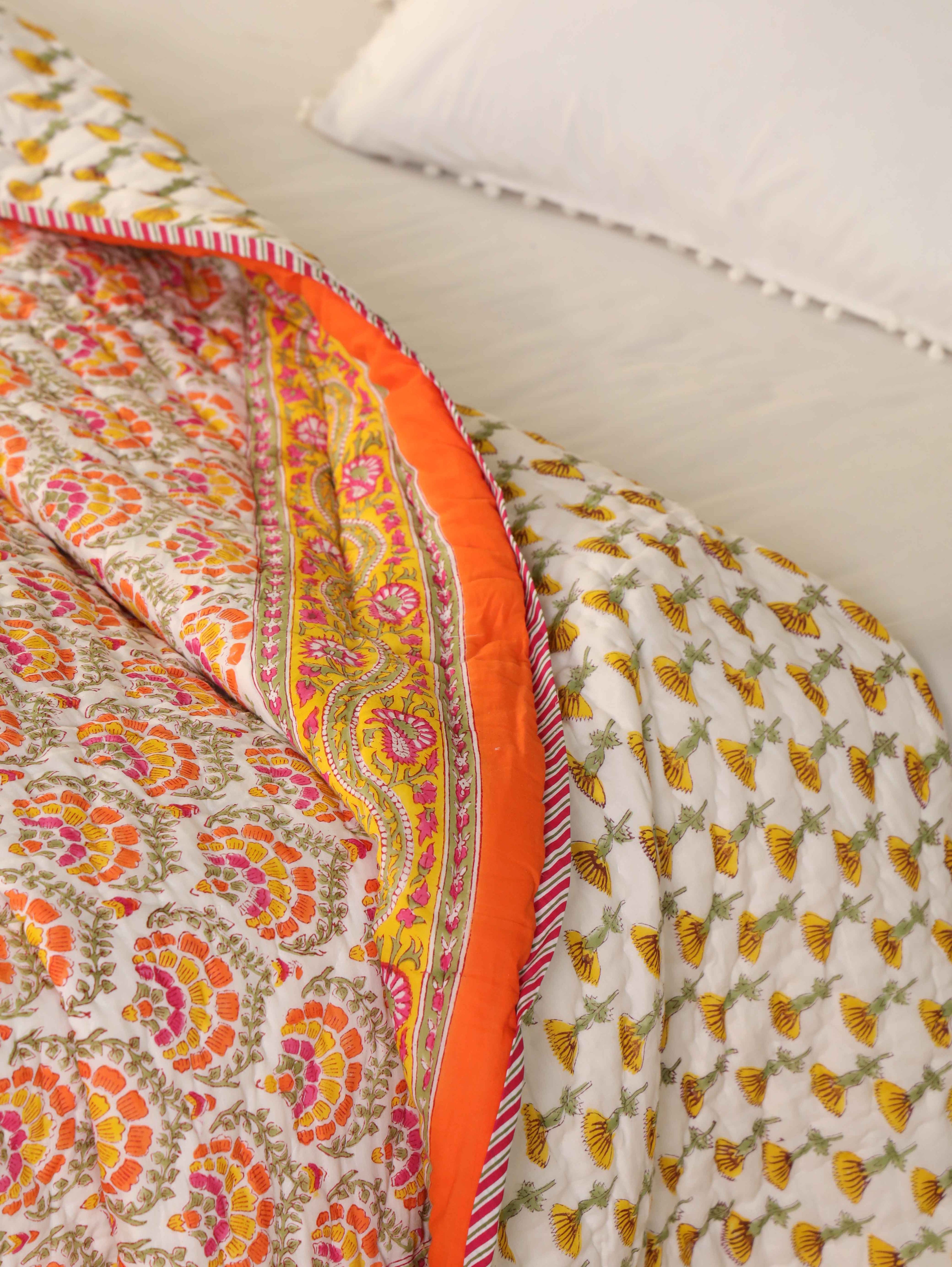 AMBER BLOOM ORANGE HAND BLOCK PRINT REVERSIBLE COTTON QUILT/RAZAI